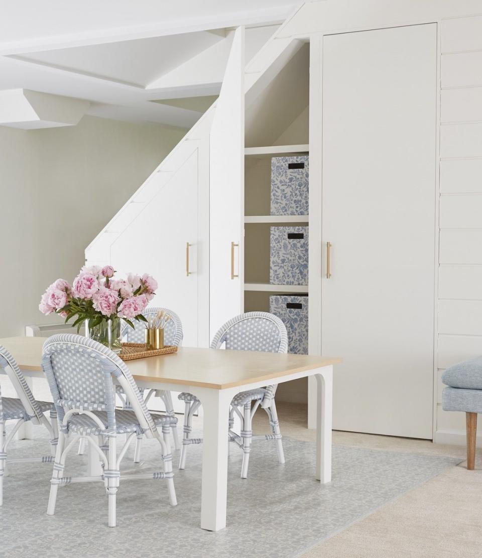 a dining room with a white door