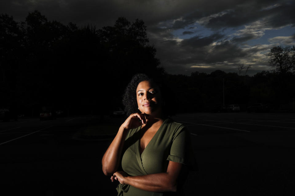 Charisse Davis poses for a portrait on Friday, July 24, 2020, in Marietta, Ga. Davis was recently elected the only Black woman on the Cobb County School Board. "We've been watching from the sidelines and allowing other people to take their turns, and take these positions of power," Davis said. "Now here we are to essentially fix it." (AP Photo/Brynn Anderson)