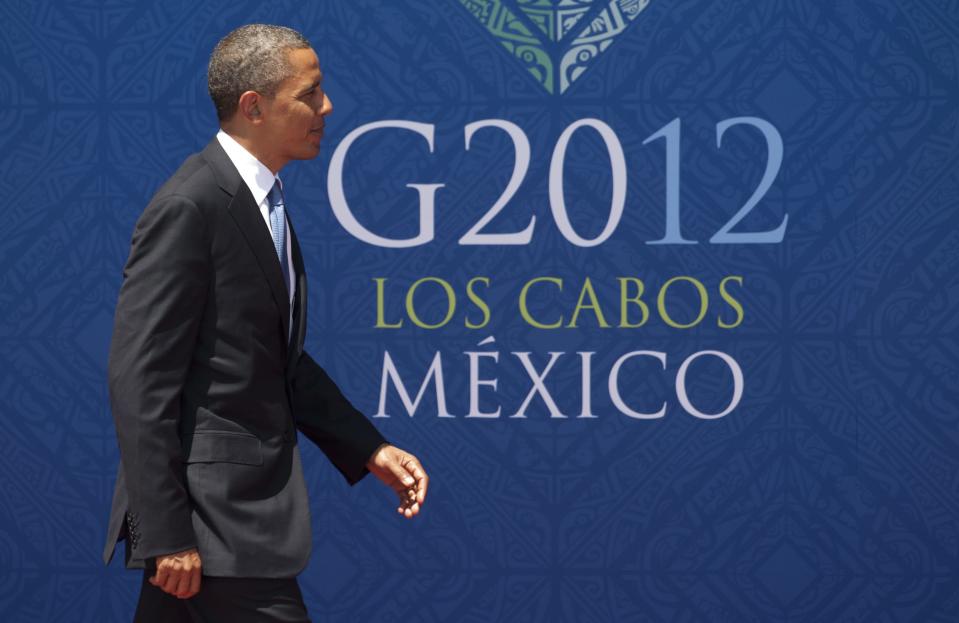 President Barack Obama arrives at the G-20 summit in Los Cabos, Monday June 18, 2012. The leaders of the world's largest economies have agreed to step up their efforts to boost growth and job creation, which they call the top priority in fighting the effects of the European economic crisis, according to a draft of the statement to be released Tuesday at the end of the Group of 20 annual meeting. (AP Photo/The Canadian Press, Adrian Wyld)