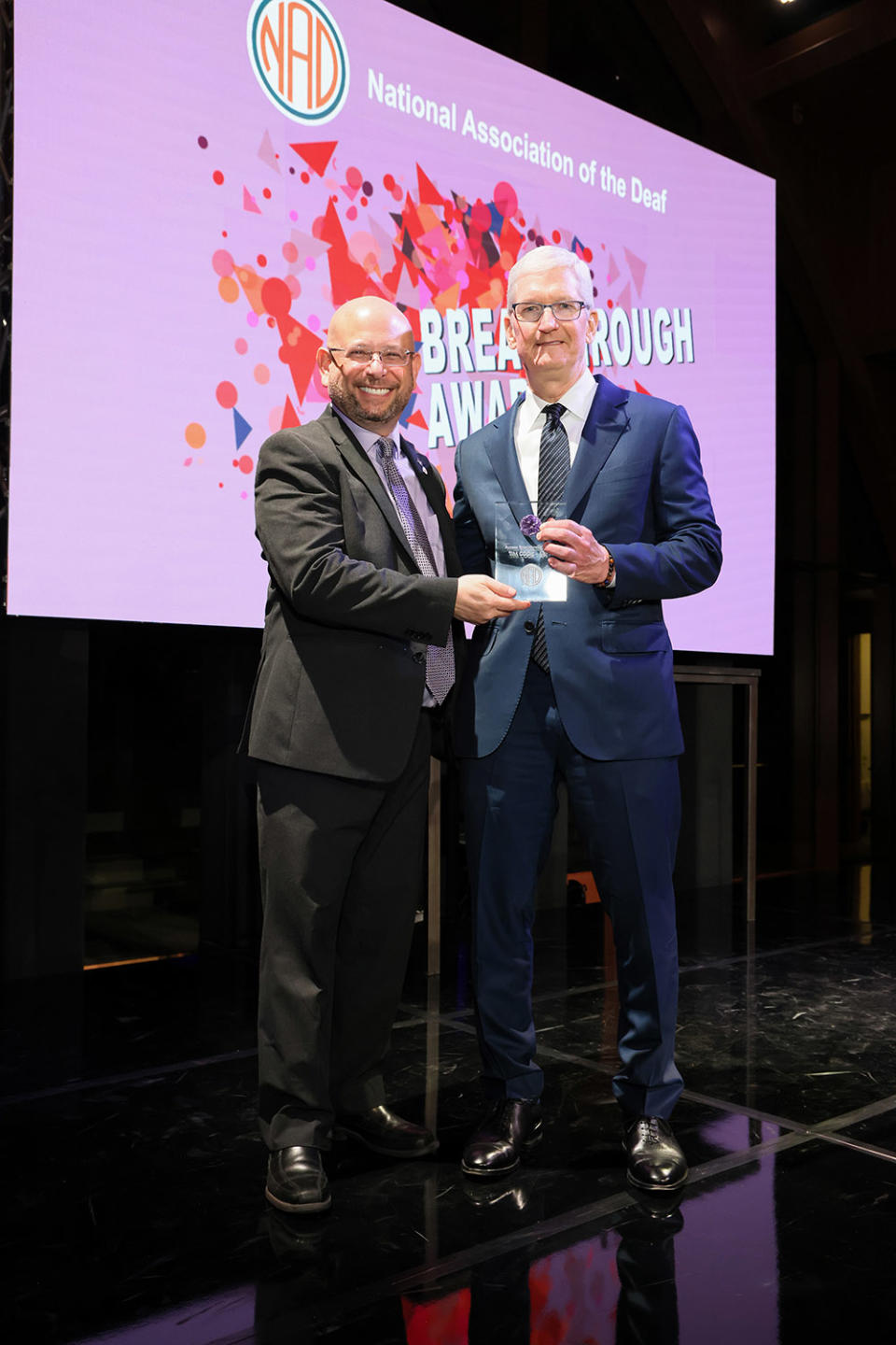 Howard Rosenblum, Chief Executive Officer at National Association of the Deaf presents Tim Cook, Chief Executive Officer, Apple Inc., with the Access Breakthrough Award during the 2023 NAD Breakthrough Awards Gala presented by the National Association of the Deaf at Audrey Irmas Pavilion on October 25, 2023 in Los Angeles, California.