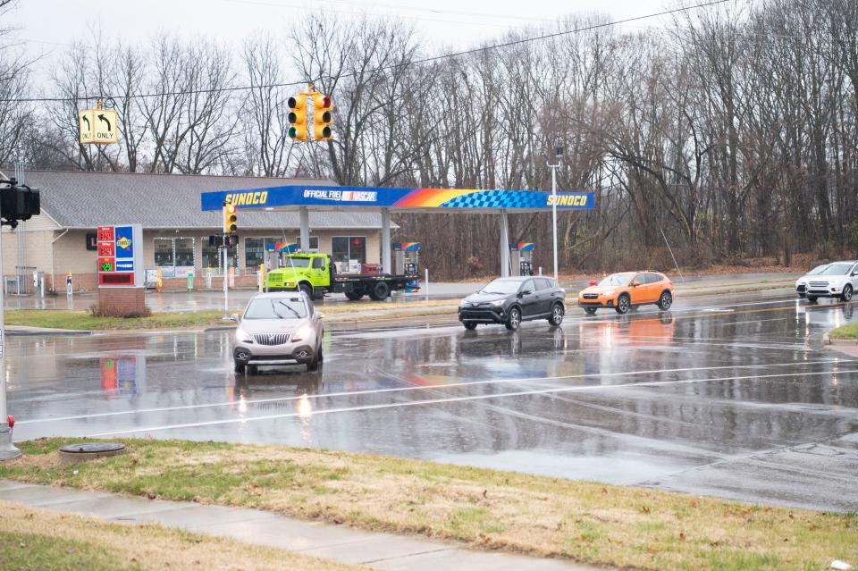 Vehicles at the intersection of Avenue A and Helmer Road in Springfield on Friday, Dec. 1, 2023.