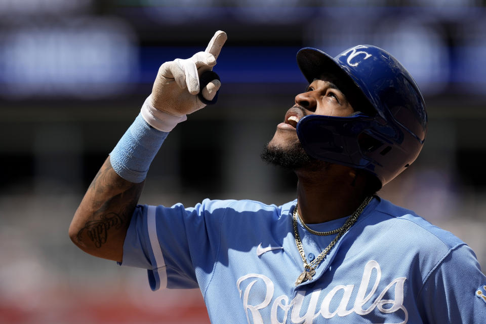 Kansas City Royals' Maikel Garcia celebrates on first after hitting an RBI single during the sixth inning of a baseball game against the Los Angeles Dodgers Sunday, July 2, 2023, in Kansas City, Mo. (AP Photo/Charlie Riedel)