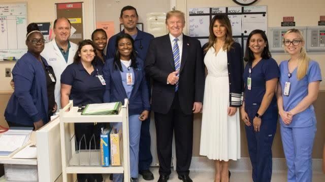 After visiting the Broward County Sheriff’s Office, President Trump posed with medics who treated victims of the deadly Parkland school shooting. People are puzzled by his smile. Photo: Donald Trump Twitter