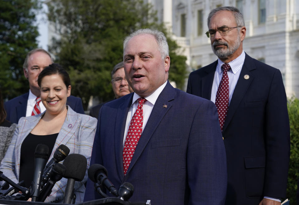 House Minority Whip Steve Scalise, R-La., joined by House Republican Conference Chair Elise Stefanik, R-N.Y., left, and members of the GOP Doctors Caucus, speaks during a news conference about the Delta variant of COVID-19 and the origin of the virus, at the Capitol in Washington, Thursday, July 22, 2021. (AP Photo/J. Scott Applewhite)