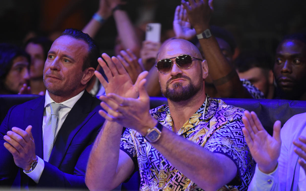 LIVERPOOL, ENGLAND - JUNE 17: Boxing promoter Kalle Sauerland watches on with Tyson Fury during the Vacant IBF International Heavyweight Championship fight between Nathan Gorman and Thomas Salek as part of the Wasserman fight night at M&S Bank Arena on June 17, 2022 in Liverpool, England. (Photo by Nathan Stirk/Getty Images)