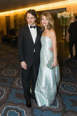 U.S. actress Claire Danes and her husband, British actor Hugh Dancy, arrive for a banquet after the Organisation for the Prohibition of Chemical Weapons (OPCW) received their 2013 Nobel Peace Prize award at the City Hall in Oslo December 10, 2013. REUTERS/Fredrik Varfjell