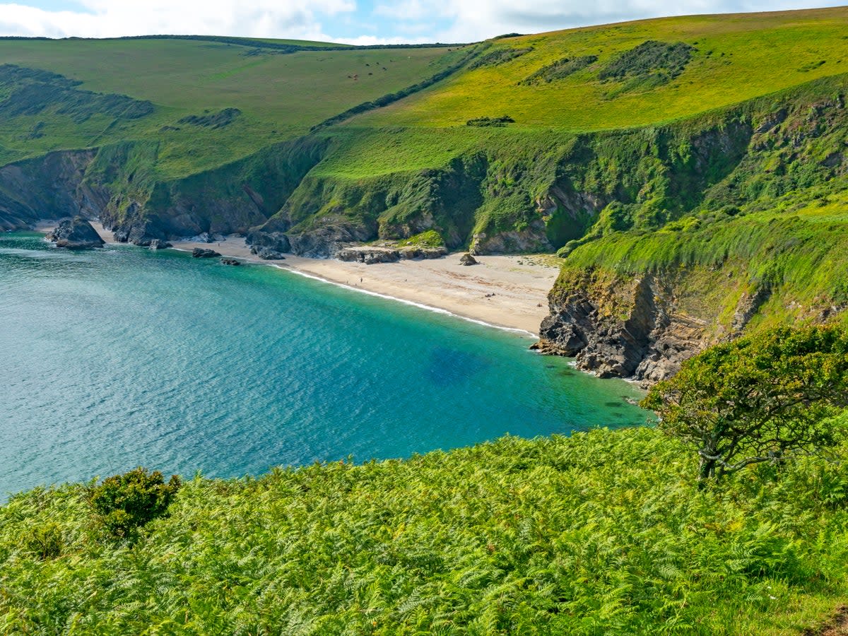 Come prepared for a hike down some uneven steps and a slope to reach this secret beach (Getty Images/iStockphoto)