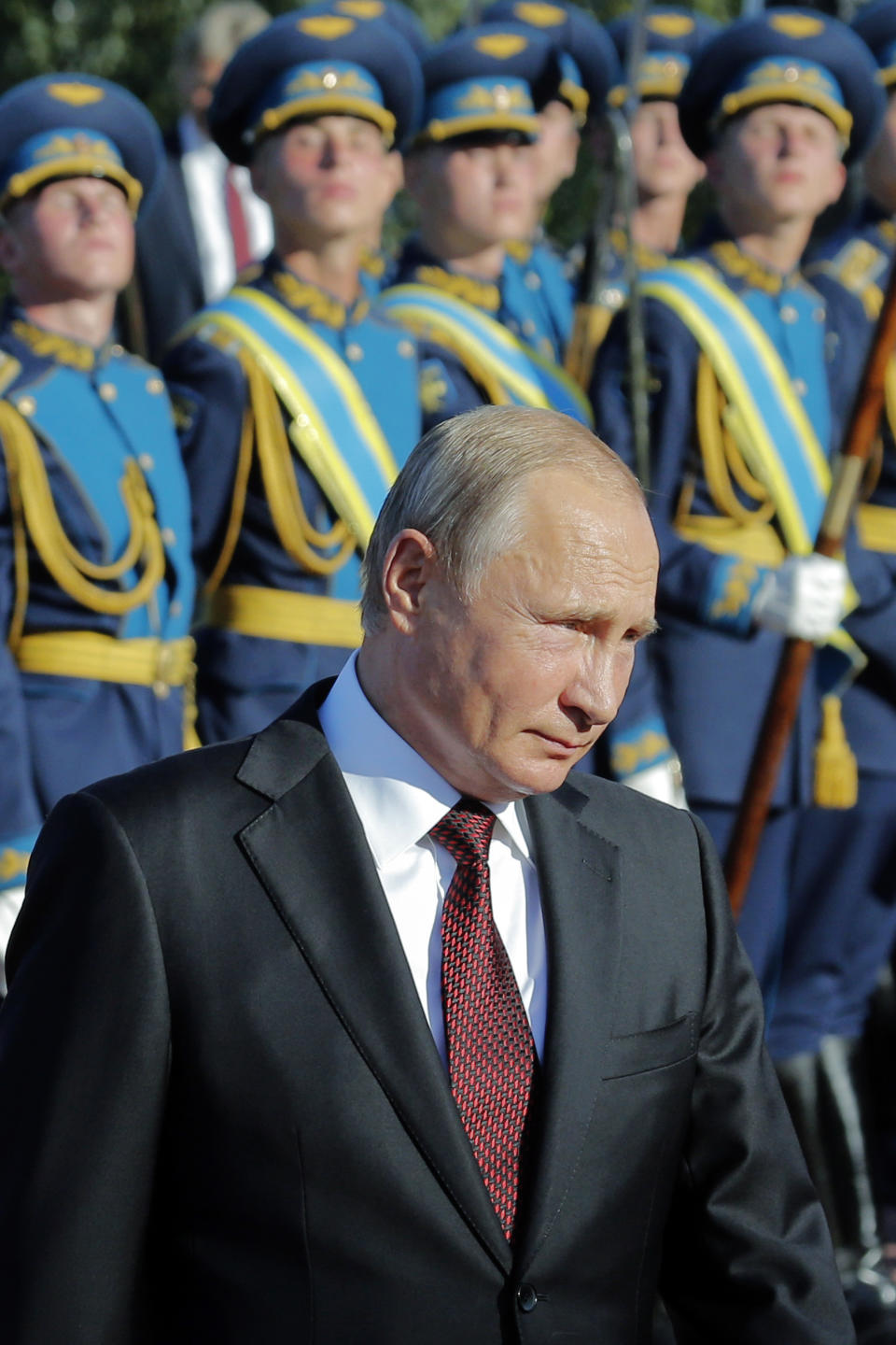 Russian President Vladimir Putin attends a laying ceremony in Kursk, 426 kilometers (266 miles) south of Moscow, Russia, Thursday, Aug. 23, 2018. Putin attended a ceremony marking the 75th anniversary of the battle of Kursk in which the Soviet army routed Nazi troops. It is described by historians as the largest tank battle in history involving thousands of tanks. (AP Photo/Alexander Zemlianichenko, Pool)