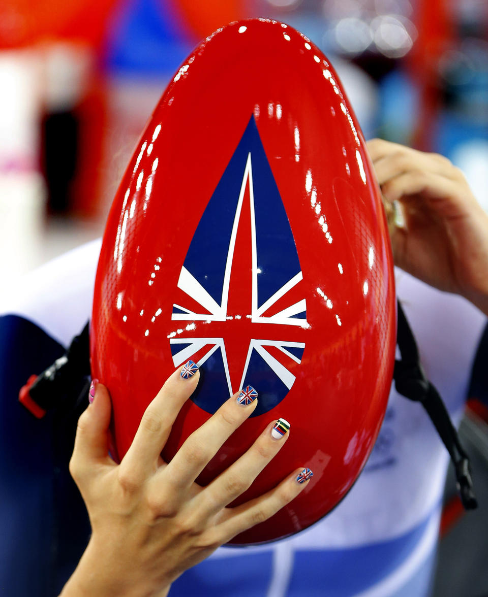 The Union Flag and the rainbow stripes of a world champion cyclist are painted on the fingernails of Britain's Laura Trott ahead of her women's track cycling ominium 3km individual pursuit race at the Velodrome during the London 2012 Olympic Games August 7, 2012. REUTERS/Cathal McNaughton (BRITAIN - Tags: SPORT OLYMPICS CYCLING TPX IMAGES OF THE DAY)