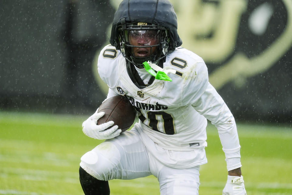 Colorado wide receiver LaJohntay Wester runs after catching a pass during the first half of the team's spring NCAA college football game Saturday, April 27, 2024, in Boulder, Colo. (AP Photo/David Zalubowski)