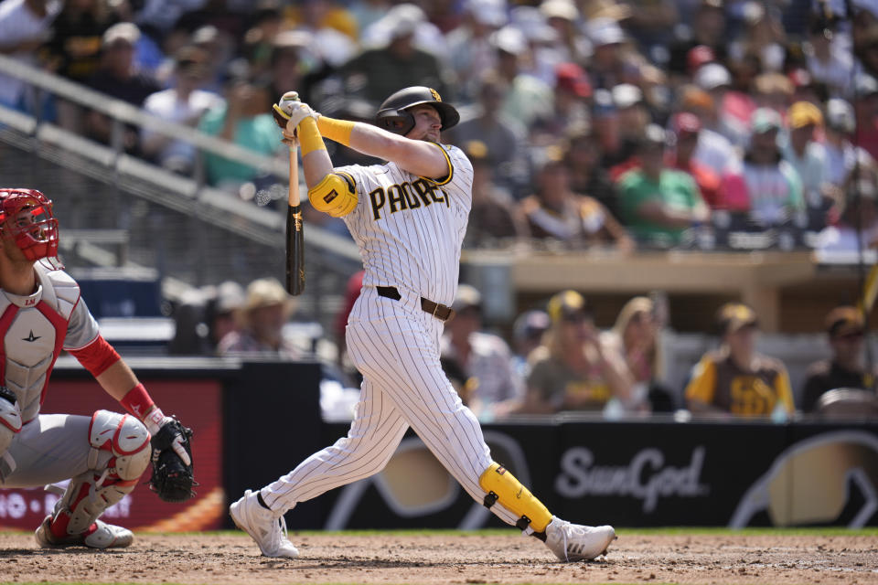 San Diego Padres' Jake Cronenworth watches his grand slam during the seventh inning of a baseball game against the Cincinnati Reds, Wednesday, May 1, 2024, in San Diego. (AP Photo/Gregory Bull)