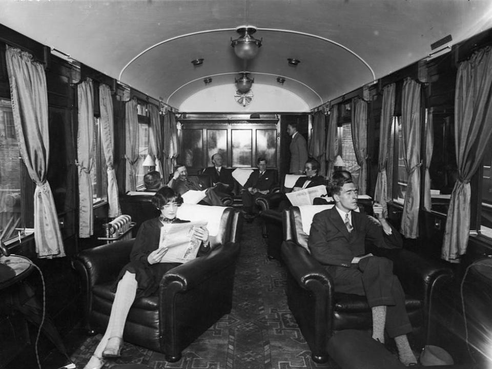 A first-class train car lounge pictured in 1928.