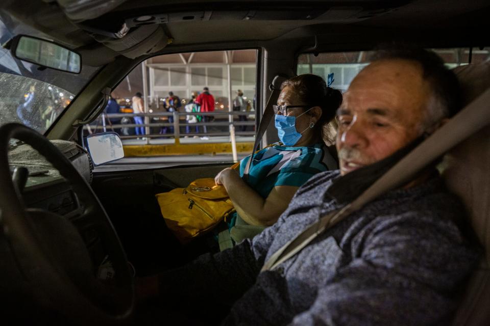 Camilo Chavarria Jaques and his wife Amelia Armas Duran waited to cross the Paso Del Norte international bridge linking Ciudad Juarez, Mexico, to El Paso, Texas, as they waited for the reopening of the border on November 7, 2021, after nearly two years of pandemic restrictions.