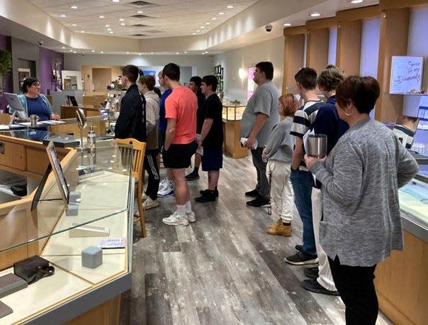 Michelle Turner Ganz of Dean's Jewelry speaks to students from the Coshocton High School Entrepreneur Club during a May 2023 field trip. Turner Ganz spoke to the group previously on her longtime family owned business.