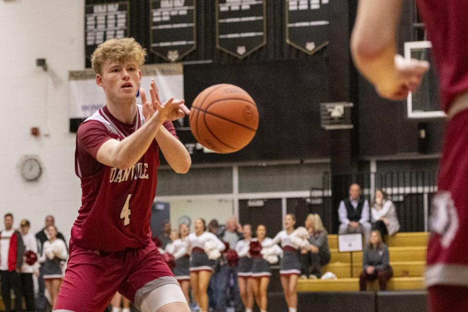 Danville High School sophomore Jace Scrafton (4) makes a pass during the first half of an IHSAA Class 3A Regional championship game against Guerin Catholic High School, Saturday, March 11, 2023, at Lebanon High School.