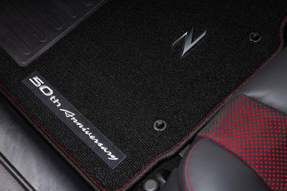 <p>These extend to the steering wheel wrapped in faux suede, to the plate surrounding the shifter, and to the leather-trimmed seats.</p>