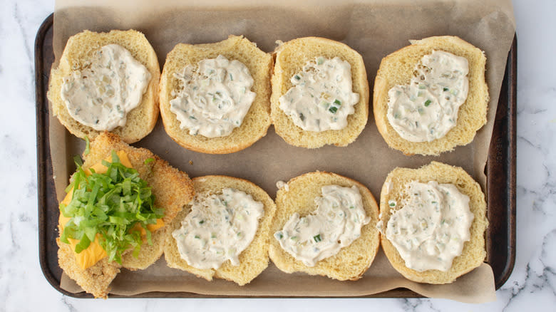 Tartar sauce on hamburger buns