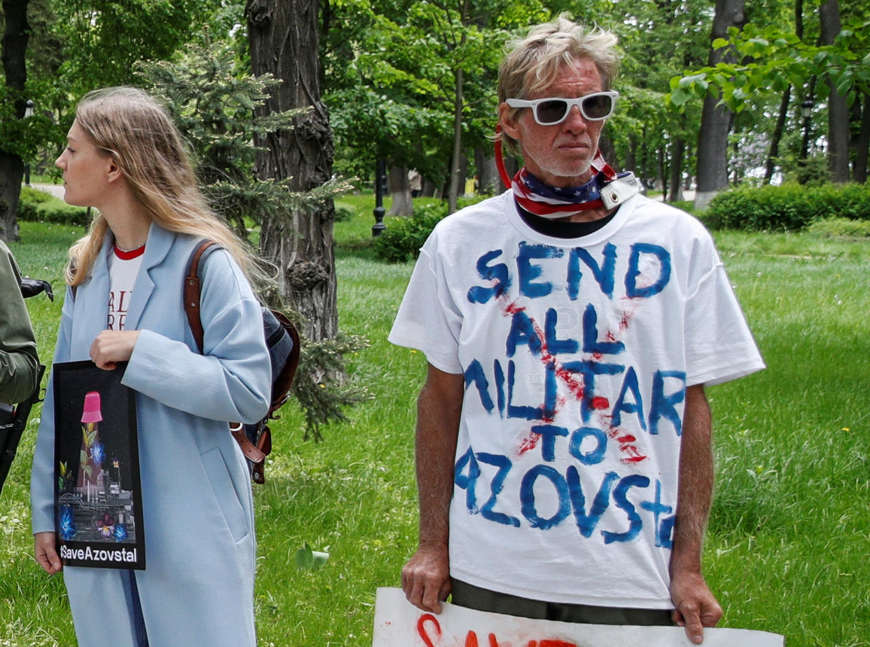 Ryan W. Routh, a suspect identified by news organizations, as the FBI investigates what they said was an apparent assassination attempt in Florida on Republican presidential nominee and former U.S. President Donald Trump, attends a rally demanding China's leader's assistance to organise an extraction process for Ukrainian service members from Azovstal Iron and Steel Works in Mariupol, in Kyiv, Ukraine May 17, 2022. REUTERS/Valentyn Ogirenko