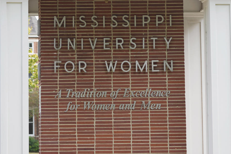 FILE - A wall displays lettering for the student body of Mississippi University for Women at the Columbus, Miss., campus, Oct. 23, 2023. The university announced a proposal Tuesday, Feb. 13, 2024, to change its name to Wynbridge State University of Mississippi, with officials saying the new name is supposed to reflect the diversity of the public institution that has been enrolling men since 1982. (AP Photo/Rogelio V. Solis, File)