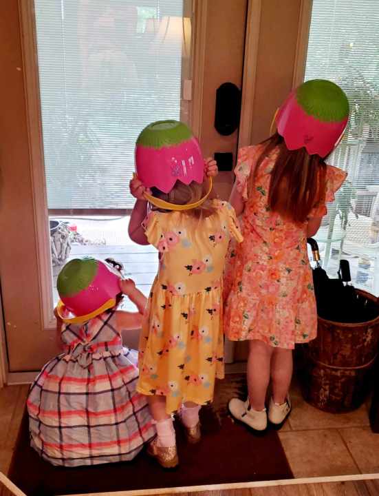 Kaci Koviak's children wear their Easter baskets like hats.