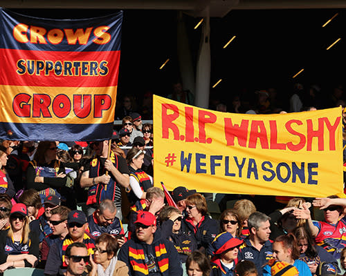 Fans fly banners to honour Walshy.