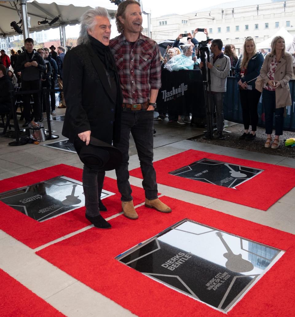 Marty Stuart and Dierks Benley pose with Bentley's marker during the Music City Walk of Fame Induction Ceremony at Walk of Fame Park Tuesday, April 5, 2022 in Nashville, Tenn. 