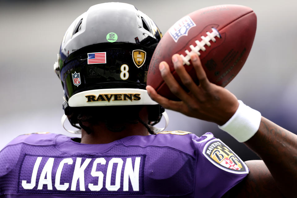 BALTIMORE, MARYLAND – OCTOBER 23: Lamar Jackson #8 of the Baltimore Ravens throws the ball during warmups before the game against the Cleveland Browns at M&T Bank Stadium on October 23, 2022 in Baltimore, Maryland. (Photo by Patrick Smith/Getty Images)