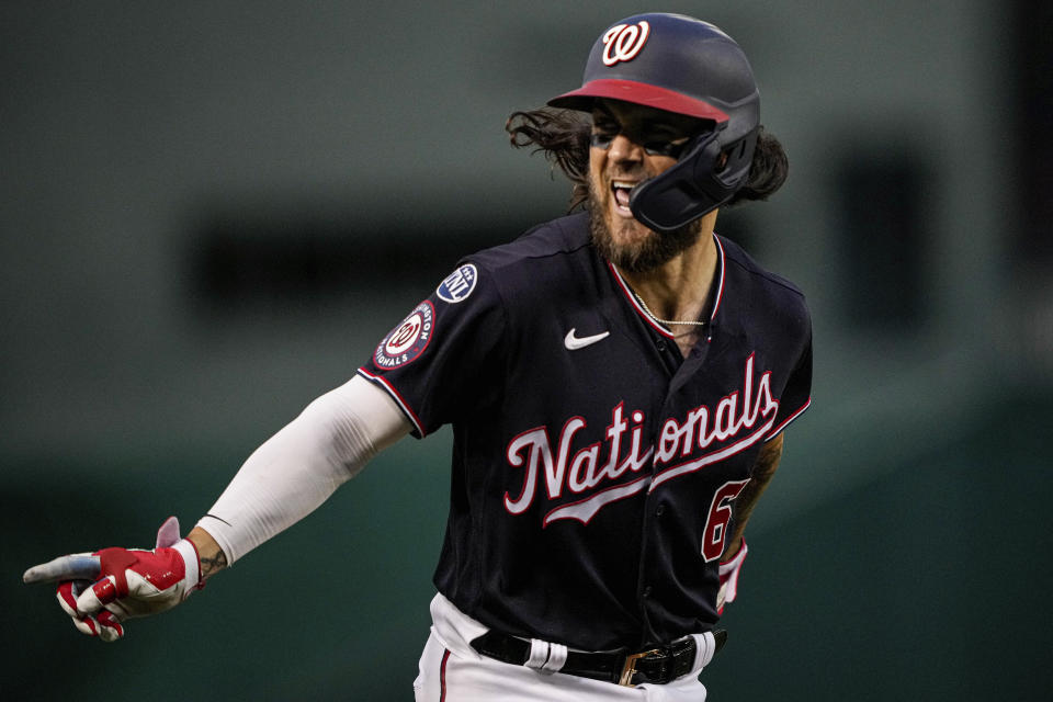 Washington Nationals' Michael Chavis reacts after hitting a solo home run against the Boston Red Sox during the third inning of a baseball game at Nationals Park, Wednesday, Aug. 16, 2023, in Washington. (AP Photo/Andrew Harnik)