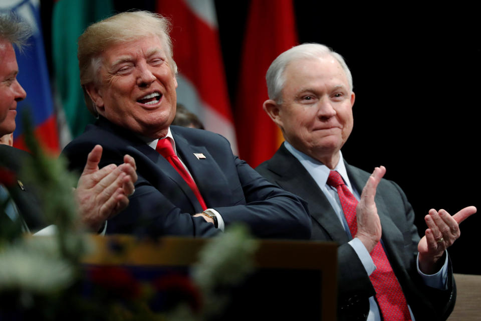 President Donald Trump with Attorney General Jeff Sessions at a graduation ceremony at the FBI Academy in Quantico, Virginia, on Dec. 15. (Photo: Jonathan Ernst / Reuters)