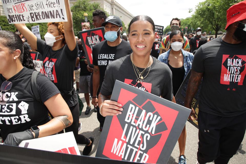 Cloud and the Washington Wizards players lead “Together We Stand” March in Washington, D.C.