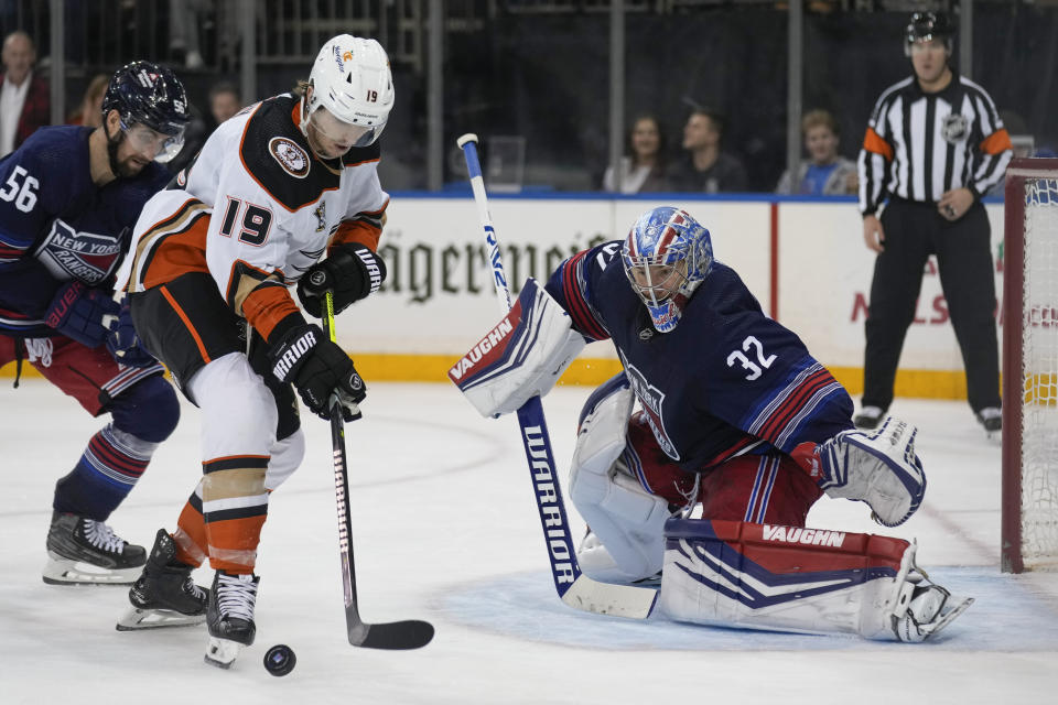 Anaheim Ducks' Troy Terry, left, looks for a shot on New York Rangers goaltender Jonathan Quick during the third period of an NHL hockey game, Friday, Dec. 15, 2023, in New York. (AP Photo/Seth Wenig)