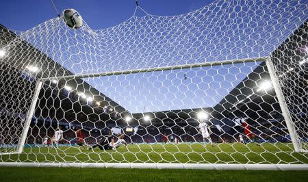 Football Soccer - Portugal v Iceland - EURO 2016 - Group F - Stade Geoffroy-Guichard, Saint-Etienne, France - 14/6/16 Portugal's Nani scores a goal past Iceland's Hannes Halldorsson REUTERS/Kai Pfaffenbach Livepic