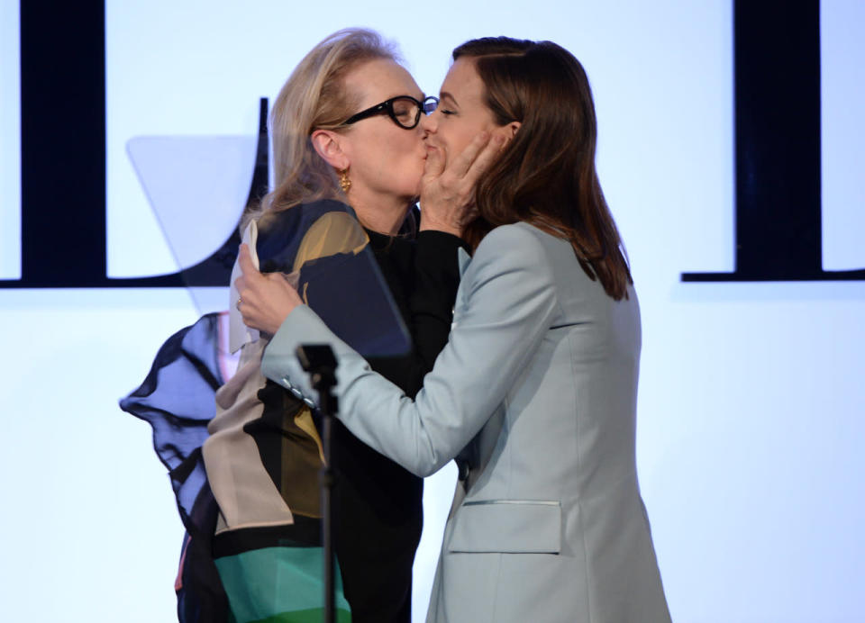 Meryl Streep stole a kiss from co-star Carey Mulligan at the ELLE Women in Hollywood Awards.