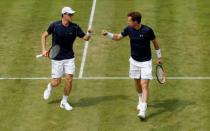 Tennis - Great Britain v France - Davis Cup World Group Quarter Final - Queen’s Club, London - 18/7/15 Great Britain's Jamie Murray and Andy Murray celebrate between points during their doubles match Action Images via Reuters / Andrew Boyers Livepic