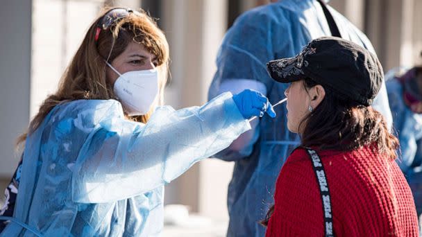 PHOTO: A fan is swabbed at the COVID-19 testing site prior to attending the opening night game of the Tomlin UNITED Tour on March 29, 2022 in San Diego, Calif. (Daniel Knighton/Getty Images, FILE)