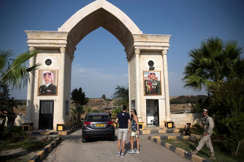 People make their way to visit the "Island of Peace" in an area known as Naharayim in Hebrew and Baquora in Arabic, on the Jordanian side of the border with Israel