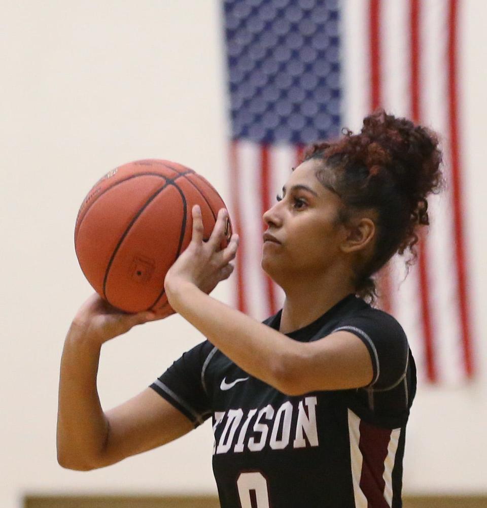 Edison's JaKayla Costello takes aim at a three point shot.