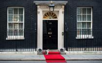 <p>10 Downing Street, home to British Prime Minister Theresa May, perhaps vies with the White House in worldwide recognition. It has been home to prime ministers of Britain since 1735. In comparison to the overt palaces of other world leaders, the true size of 10 Downing Street is somewhat opaque: The external simplicity belies an internal labyrinth. This seemingly modest townhouse has long been merged with the surrounding buildings, now boasting a myriad of doors, hallways and over 100 rooms. The home is never open to the public but can be glimpsed through the gates from Whitehall.</p>