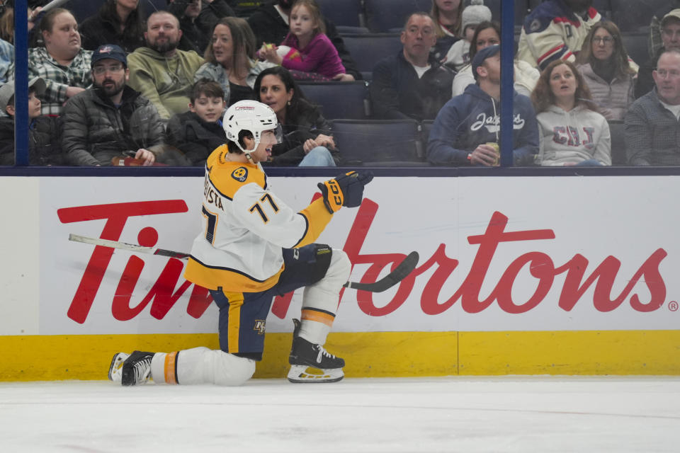 Nashville Predators' Luke Evangelista celebrates scoring a goal during the third period of an NHL hockey game against the Columbus Blue Jackets, Saturday, March 9, 2024, in Columbus, Ohio. (AP Photo/Aaron Doster)