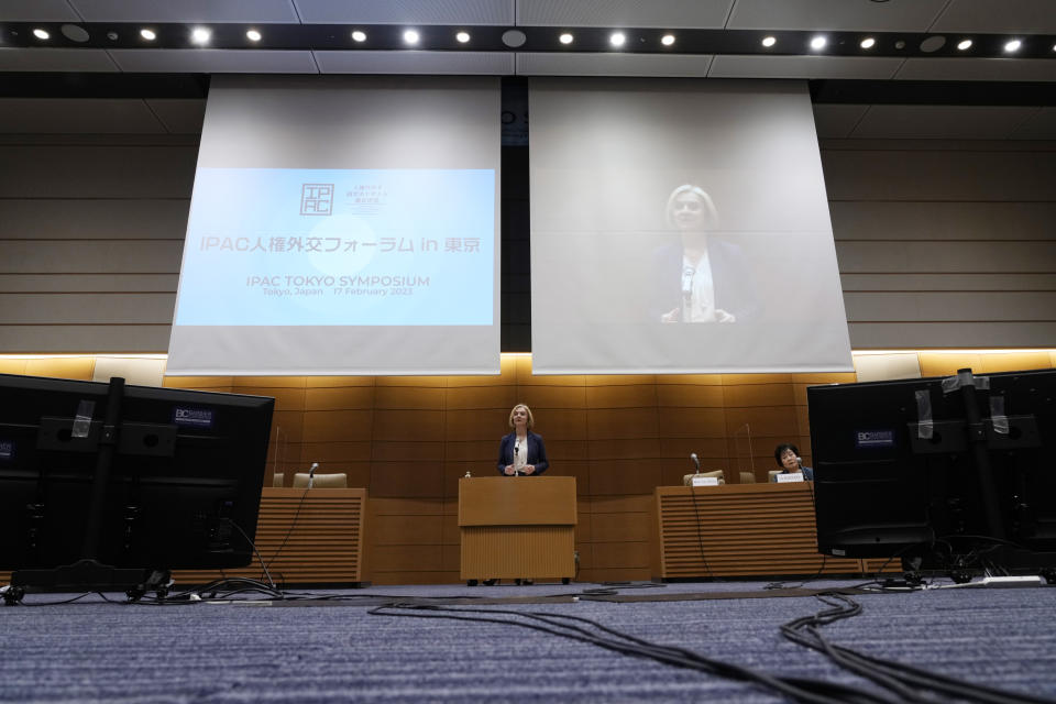 Former British Prime Minister Liz Truss delivers speech during a symposium of the Inter-Parliamentary Alliance on China at the Diet Members Building Friday, Feb. 17, 2023, in Tokyo. (AP Photo/Eugene Hoshiko)