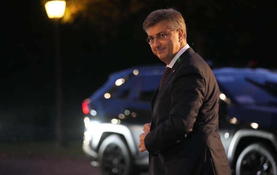 Croatia's Prime Minister Andrej Plenkovic arrives for a dinner event at an EU summit, at the Brdo Castle in Kranj, Slovenia, Tuesday, Oct. 5, 2021. EU leaders are meeting Tuesday evening to discuss increasingly tense relations with China and the security implications of the chaotic U.S.-led exit from Afghanistan, before taking part in a summit with Balkans leaders on Wednesday. (AP Photo/Darko Bandic)