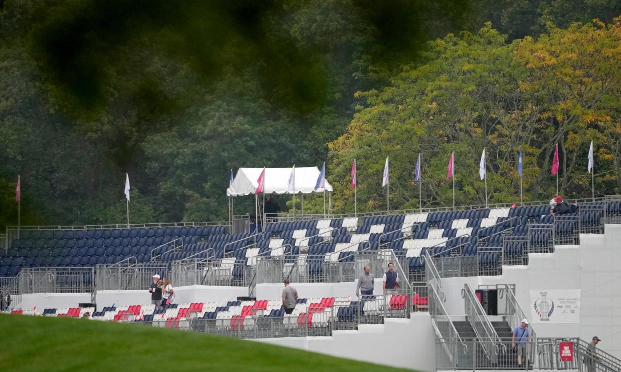 <span>An empty grandstand greeted the early players at the start of day one of the 2024 Solheim Cup.</span><span>Photograph: Matt York/AP</span>