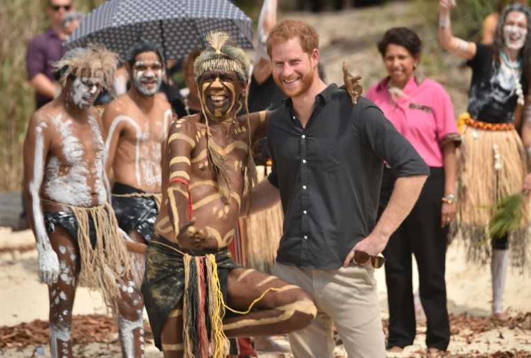 Britain's Prince Harry poses for a photo with Indiginous Australian Joe Gala during his visit to Fraser Island