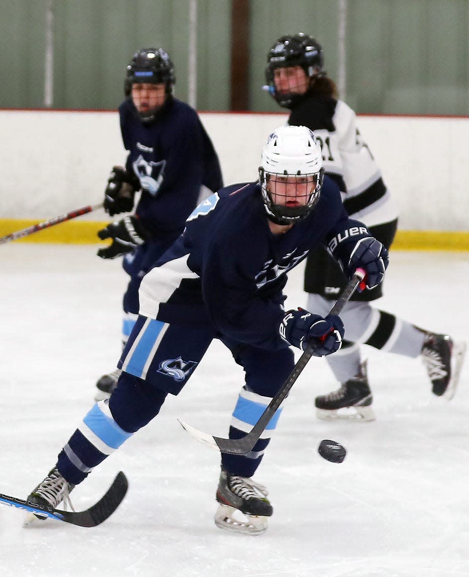 North Avalanche's Kathryn Lonergan (14) controls a pass during game against the Rockland Rockies in the Section 1 girls hockey championship at the Brewster Ice Arena Feb. 8, 2024. Feb. 7, 2024. The Avalanche won the game 4-0.