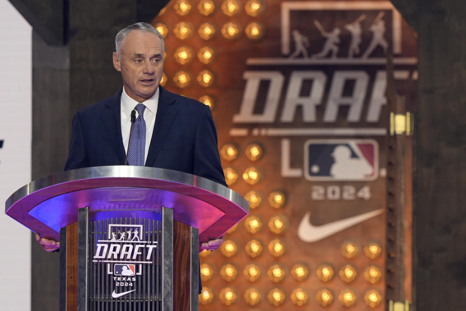 Major League Baseball Commissioner Rob Manfred makes comments during the MLB baseball draft in Fort Worth, Texas, Sunday, July 14, 2024. (AP Photo/LM Otero)