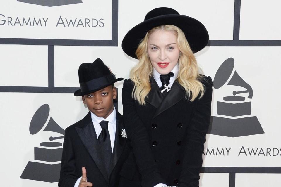 Madonna has said that life would be “less challenging” for her children if they didn’t have her as a mother.The singer has two biological children, daughter Lourdes and son Rocco, and four adopted children from Malawi – David, Mercy and twins Estere and Stella.During an interview on Friday night’s Graham Norton Show, the star said that her fame undoubtedly takes a toll on her family.“I think they wish I wasn’t Madonna,” the 60-year-old said of her children.“I think it would be less challenging in their minds if they didn’t have me as their mother.”Discussing the family’s move from the US to Lisbon, Portugal, the star explained the move was so that her son, David, could attend a football academy in Europe.As a result, Madonna – who released her album Madame X on Friday –said she found herself surprisingly becoming “a soccer mum”.> View this post on Instagram> > You can’t sit with Us........... ...... ❌ estere madamex workshop> > A post shared by Madonna (@madonna) on May 31, 2019 at 9:35am PDT“I surprised myself,” she joked.“Barcelona and Turin were an option, but I couldn’t see myself living there. It would have been a lot easier if he’d liked music!”When asked whether she is an avid spectator at her son’s football matches, she said: “I admit I only watch when he’s playing. If he’s on the bench, I’m on my phone.”Madonna’s comments come months after she said she became “a little bit depressed” as a result of the transatlantic move and struggling to make friends.In an interview with DJ Trevor Nelson during an MTV live-streamed interview in April, the star said: "So I went [to Lisbon], and I thought it was going to be like super fun and adventurous, but then I found myself going to school, picking up kids, and going to soccer matches and really being 'Netty no-mates', and I got a little bit depressed."> View this post on Instagram> > And Love is 💙.....,........ The Unbreakable Bond! estere stella children family. love> > A post shared by Madonna (@madonna) on Feb 7, 2019 at 5:55am PSTLater in her interview with Norton, the singer opened up about her shows at the London Palladium later this year and said she was excited but anxious to perform.“I’m feeling anxiety right now,” Madonna told the show’s host. “Every time feels like the first time.”“I can see everyone (in London) and they can see me, which you can’t in a stadium or sports arena.Watch Madonna’s full interview on The Graham Norton Show tonight on BBC One at 10.35pm.