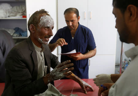 An injured man receives treatment at a hospital after a blast in Kabul, Afghanistan June 3, 2017. REUTERS/Omar Sobhan