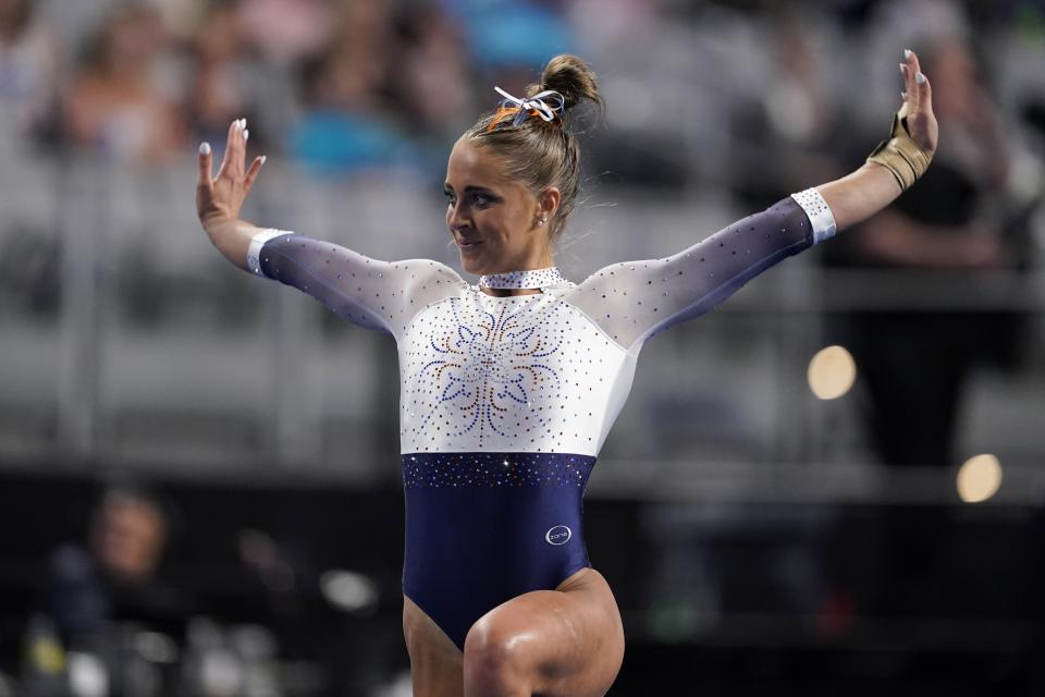 Auburn's Drew Watson competes on the floor exercise during the NCAA college women's gymnastics championships, Thursday, April 14, 2022, in Fort Worth, Texas. (AP Photo/Tony Gutierrez)
