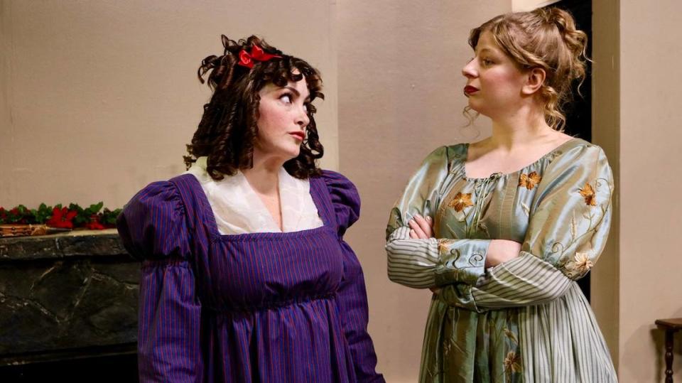 Sisters Lydia (Erin Cariker) and Elizabeth (Anne Tracy) find themselves at odds in Olympia Little Theatre’s “The Wickhams: Christmas at Pemberley,” directed by Kathryn Dorgan.