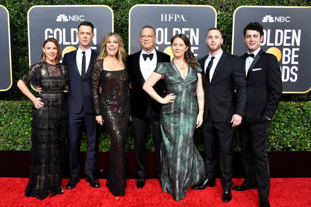 <p>Frazer Harrison/Getty</p> Tom Hanks with wife Rita Wilson and their kids, Elizabeth, Chet, Colin and Truman